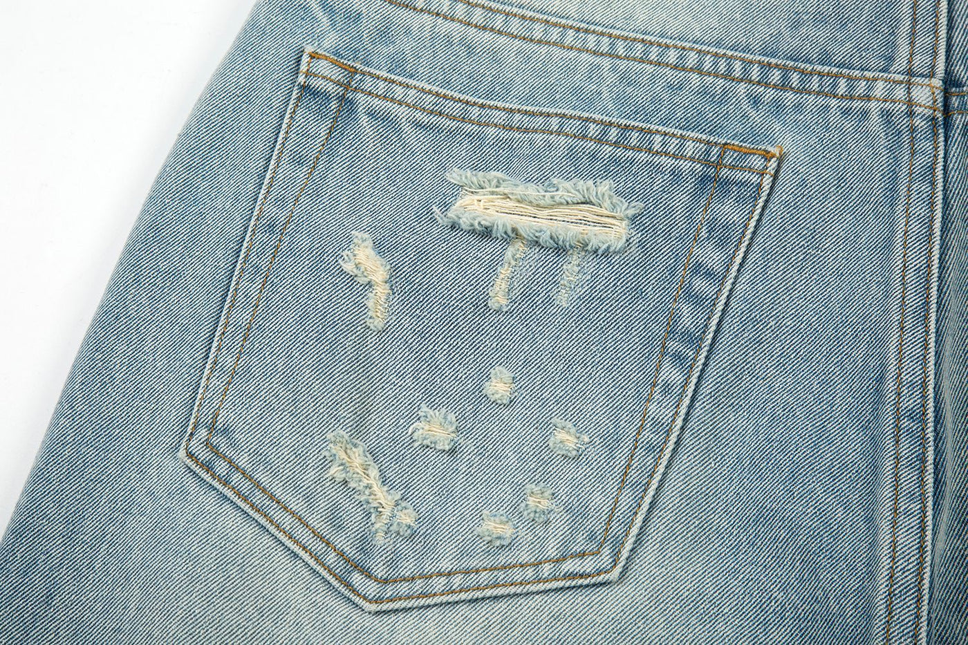 LOOSE WHISKERED DENIM FLARE PANT